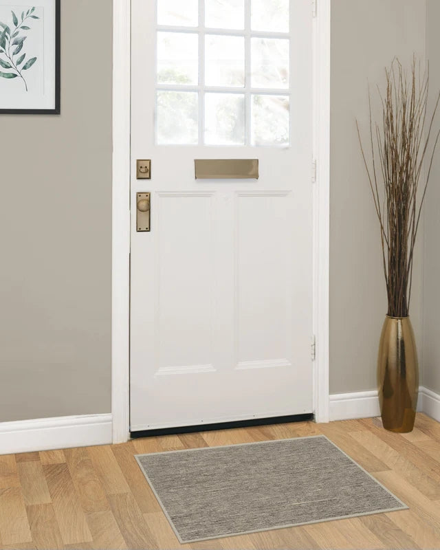 Machine washable stone color rug with non-slip backing