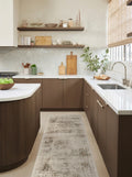 Warm hazel tufted area rug featuring distressed medallion artwork