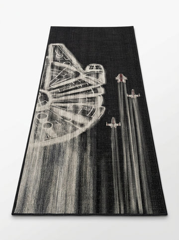 Washable tufted rug featuring futuristic space artwork