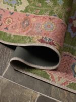 Outdoor area rug with washable polyester cover