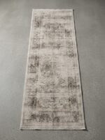 Contemporary tufted rug with durable polyester surface